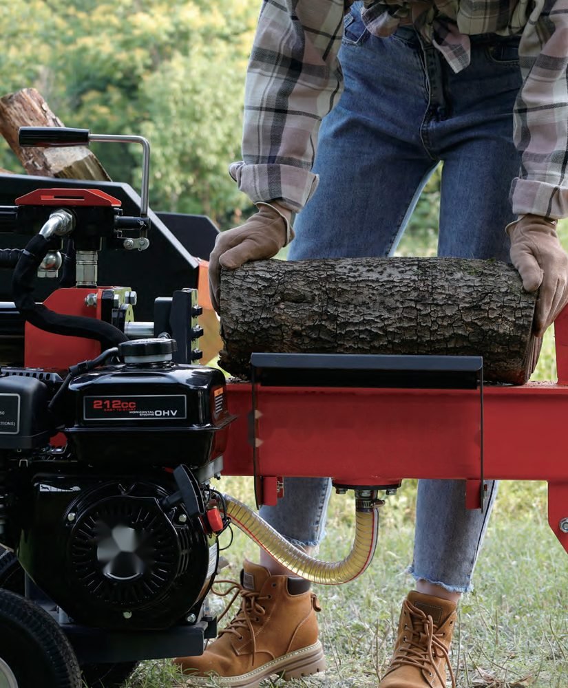 Log being loaded onto a petrol hydraulic log splitter